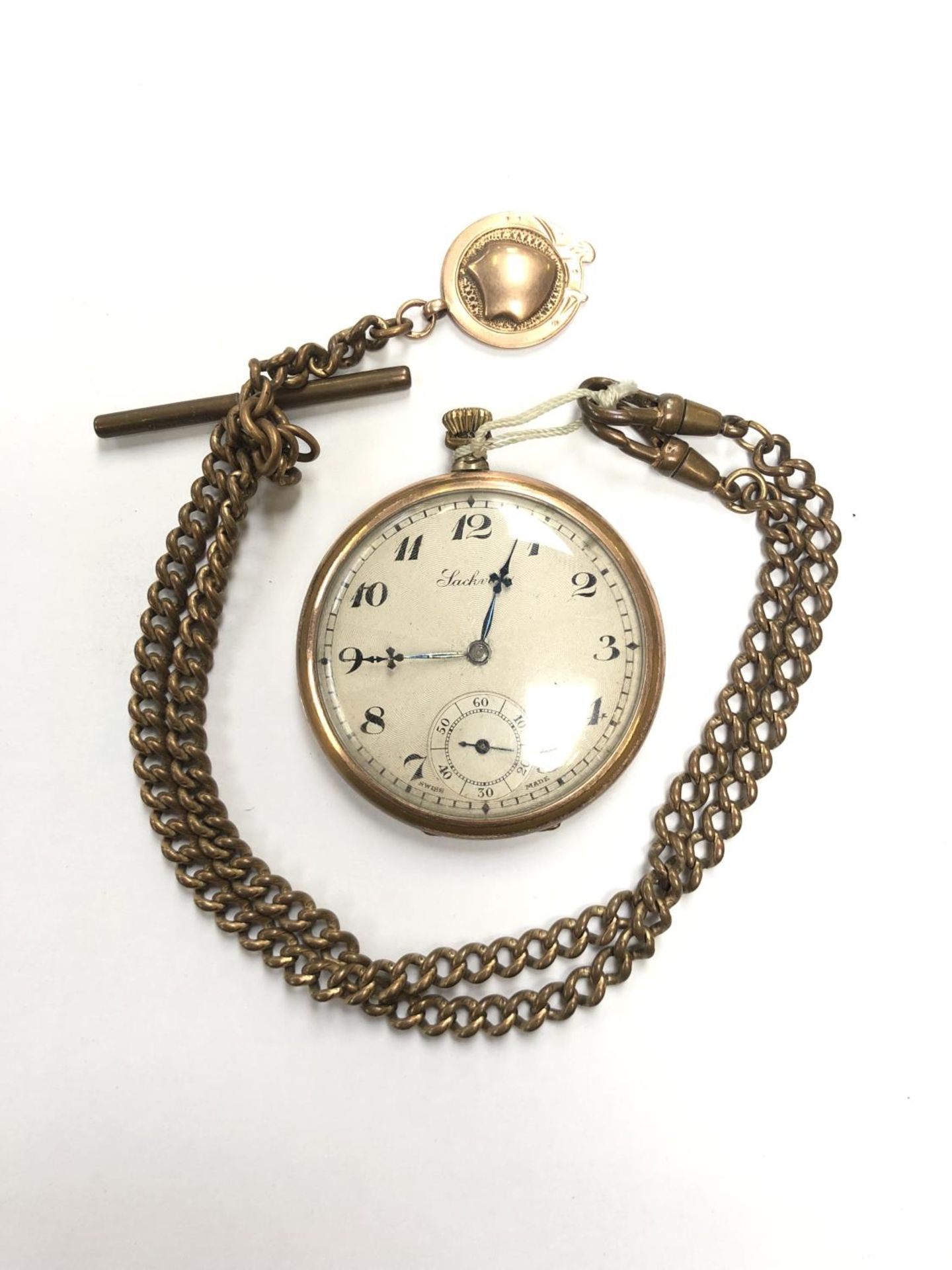 A ART DECO ROLLED GOLD POCKET WATCH WITH BASE METAL DOUBLE ALBERT CHAIN AND 9CT YELLOW GOLD FOB,