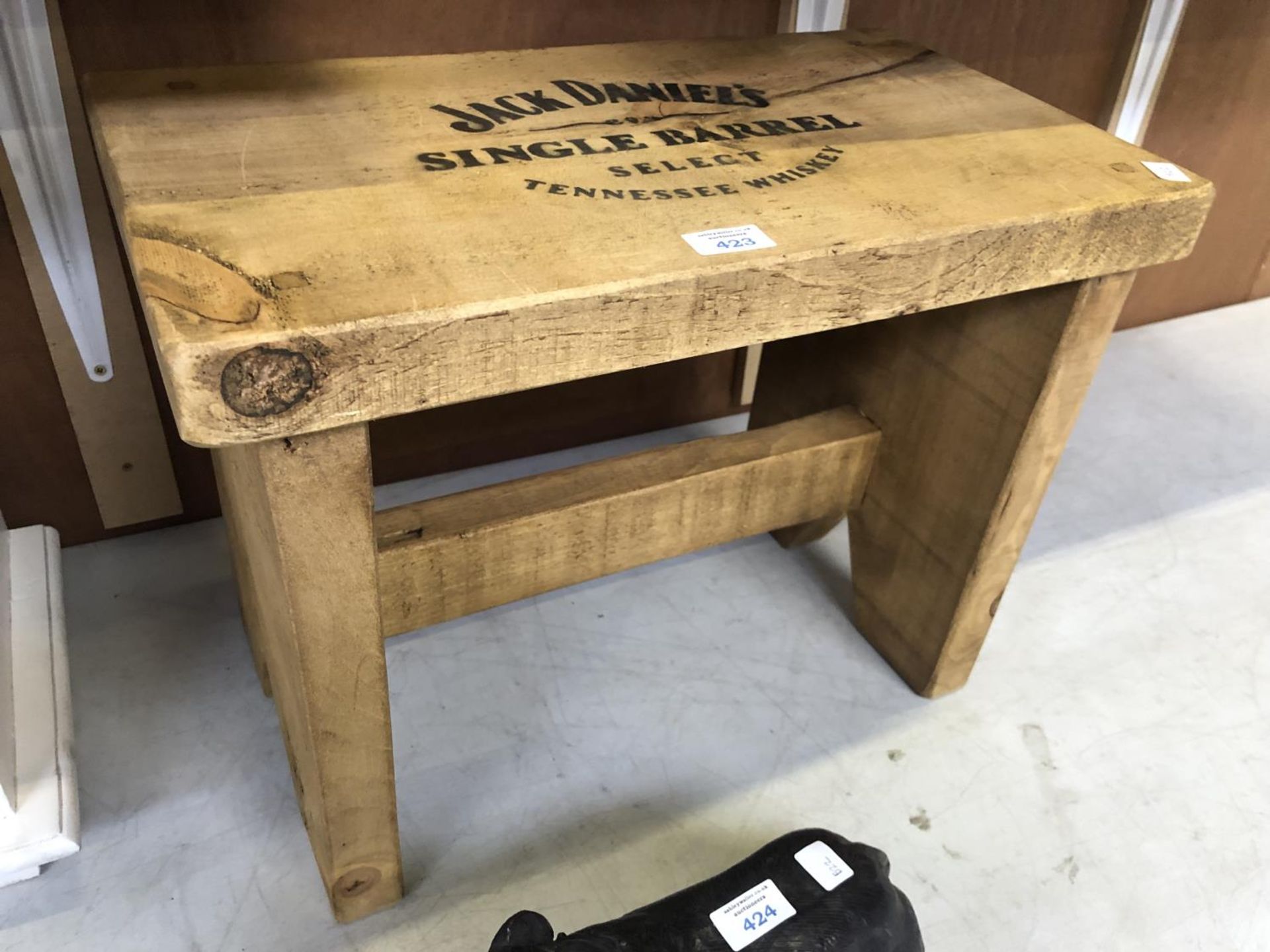 A WOODEN 'JACK DANIELS' STOOL