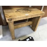 A WOODEN 'JACK DANIELS' STOOL