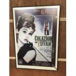 A LARGE FRAMED 'AUDREY HEPBURN' FILM POSTER STYLE PICTURE