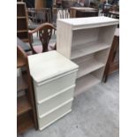 A THREE DRAWER BEDSIDE CHEST AND A THREE TIER BOOKCASE