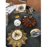 SEVEN ASSORTED CLOCKS TO INCLUDE SUNBURST DESIGN EXAMPLE ETC