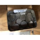 A TIN CONTAINING ASSORTED SIX PENCE COINS