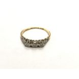 A LADIES 18CT YELLOW GOLD AND PLATINUM SET THREE STONE DIAMOND RING, WEIGHT 2.3G