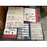 FOUR ALBUMS OF ASSORTED STAMPS