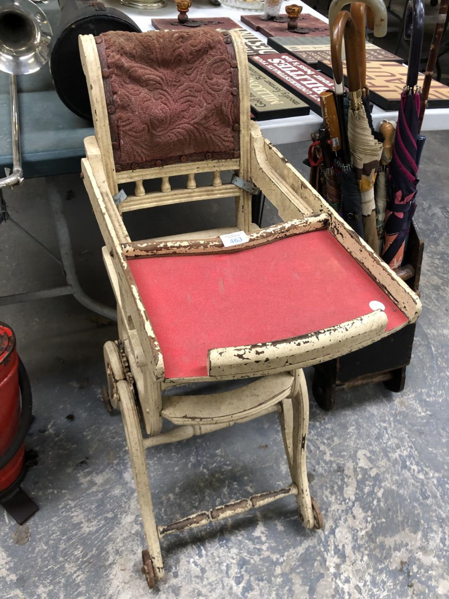 A VINTAGE WOODEN CHILD'S HIGH CHAIR SEAT