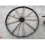 A LARGE METAL WHEEL 110CM DIAMETER