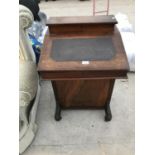 AN INLAID MAHOGANY DAVENPORT WITH HINGED TOP, PEN AND INKWELL COMPARTMENT AND FOUR SIDE DRAWERS