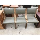 THREE RETRO TEAK DINING CHAIRS