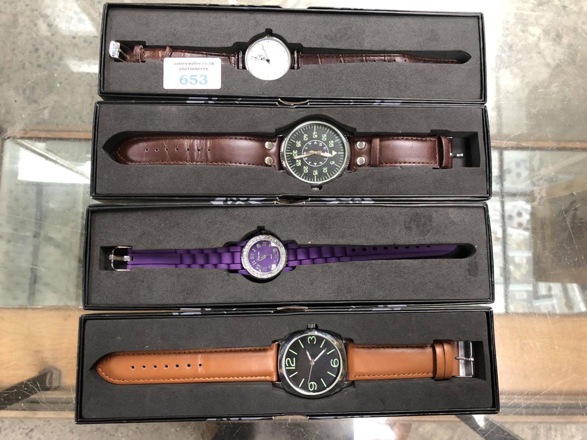 FOUR BOXED MODERN WATCHES