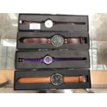 FOUR BOXED MODERN WATCHES