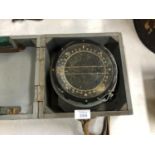 A VINTAGE CASED W.W.II BOMBER AIR MINISTRY COMPASS