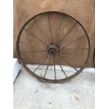 A VINTAGE LARGE METAL SPOKE WHEEL WITH CHAIN COG 120CM DIAMETER