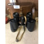 A VINTAGE CASED PAIR OF BINOCULARS