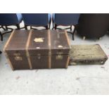 A VINTAGE TRAVELLING TRUNK WITH INNER TRAY AND A VINTAGE SUITCASE