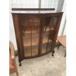 A MAHOGANY CHINA CABINET ON CABRIOLE SUPPORTS WITH TWO DOORS