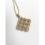 A SILVER GILT .925 LADIES NECKLACE WITH NINE STONE PENDANT