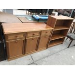 A TEAK SIDEBOARD WITH THREE DOORS AND THREE DRAWERS AND A TEAK BOOKCASE