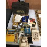 A VINTAGE METAL AMMUNITION CRATE, TINS, PHOTOS ETC (QTY)