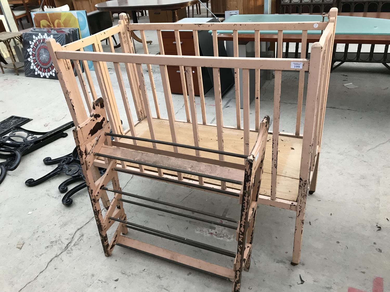 A VINTAGE WOODEN BABIES COT