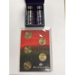 A BOXED SILVER PLATED CRUET SET AND A AUSTRALIAN COIN SET (2)