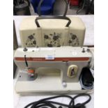 A CASED 'JONES' 871 SEWING MACHINE