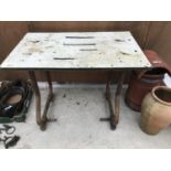 A VINTAGE INDUSTRIAL TABLE ON METAL SUPPORTS 100CM X 62CM