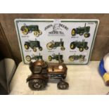 A METAL 'JOHN DEERE' SIGN AND A MODEL TRACTOR (2)