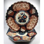 TWO JAPANESE IMARI PATTERN CHARGERS / PLATES TO INCLUDE AN OCTAGONAL EXAMPLE, DIAMETER OF LARGEST