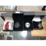 FOUR BOXED GENTS FASHION WATCHES