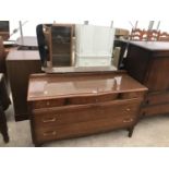 AN OAK DRESSING TABLE WITH THREE SHORT AND TWO LONG DRAWERS AND UPPER UNFRAMED MIRROR