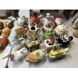 A LARGE COLLECTION OF NOVELTY CERAMIC TEAPOTS (QTY)