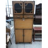 A VINTAGE CASTLES KITCHEN CABINET WITH FALL FRONT, FOUR DOORS AND TWO DRAWERS