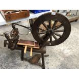 A VINTAGE WOODEN SPINNING WHEEL STOOL