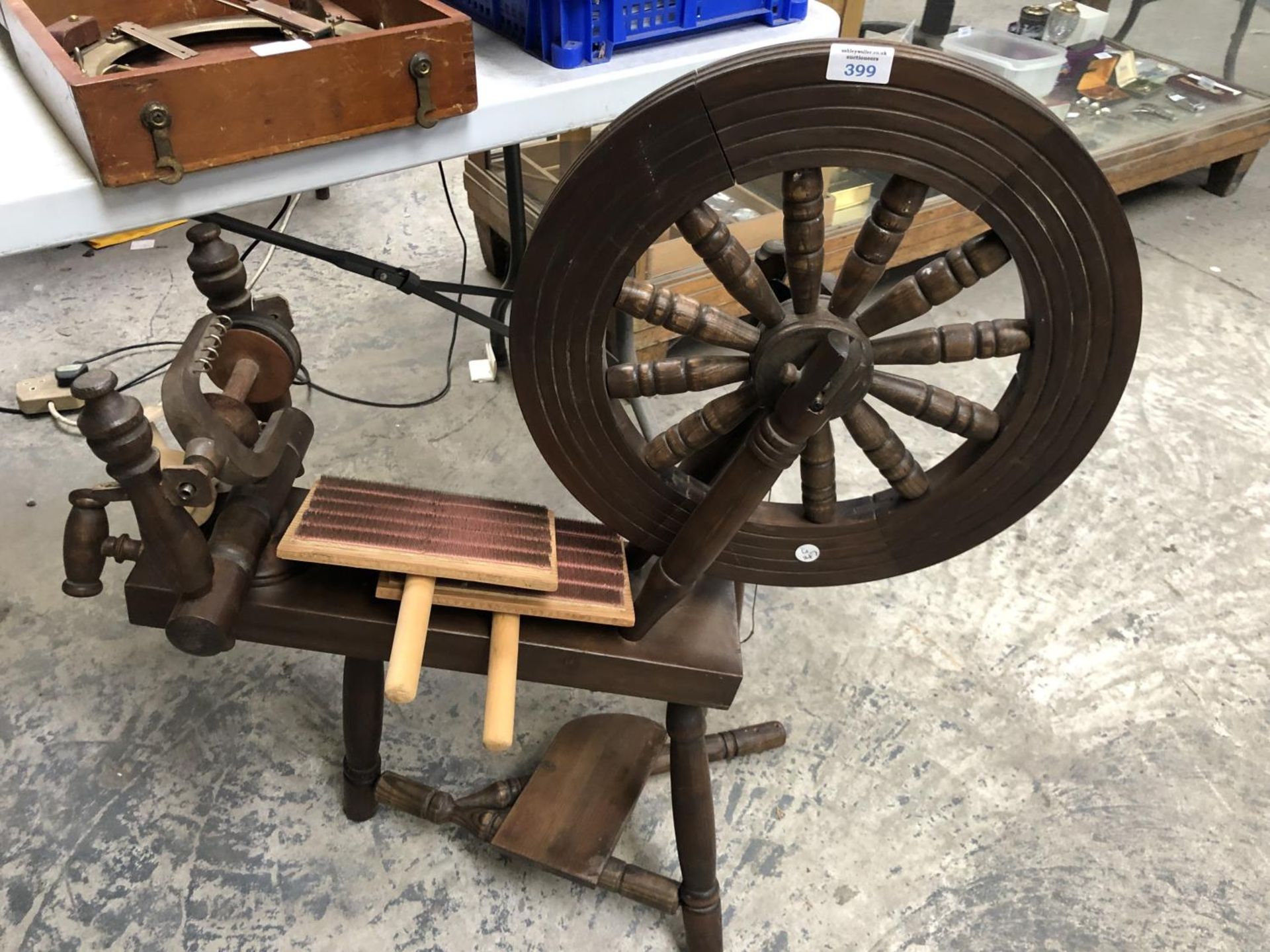 A VINTAGE WOODEN SPINNING WHEEL STOOL