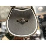 A LADIES 9CT YELLOW GOLD DIAMOND CHIP CLUSTER RING