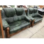 TWO OAK AND GREEN LEATHER TWO SEATER SOFAS