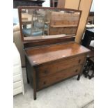 AN OAK DRESSING TABLE WITH TWO DRAWERS