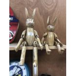 TWO WOODEN DECORATIVE SHELF PUPPETS