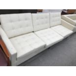 A MODERN CREAM LEATHER THREE SEATER SOFA ON SQUARE CHROME SUPPORTS 227 CM X 79 CM X 58 CM HIGH