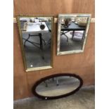 A GROUP OF THREE FRAMED MIRRORS
