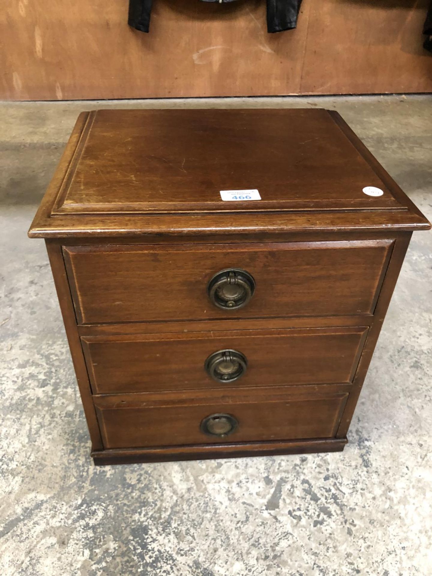 A MAHOGANY SMALL CHEST OF THREE DRAWERS FROM A DRESSING TABLE TOP