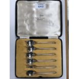 A CASED SET OF SIX HALLMARKED SILVER COFFEE SPOONS
