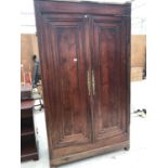 A VINTAGE FRENCH PINE ARMOIRE WARDROBE WITH ELABORATE BRASS ESCUTCHEONS (WOODWORM DAMAGE)