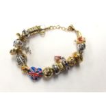 A 'BRADFORD EXCHANGE' ENGLAND CHARM BRACELET