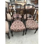 FOUR VICTORIAN CARVED MAHOGANY DINING CHAIRS