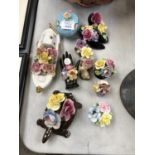 A MIXED GROUP OF FLORAL POTTERY MODELS (QTY)