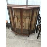 A BOW FRONT MAHOGANY CHINA CABINET ON CABRIOLE SUPPORTS WITH TWO DOORS