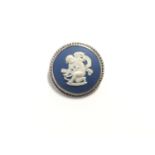 A WEDGWOOD JASPER DARK BLUE AND WHITE CIRCULAR BROOCH