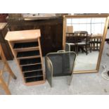 A CD RACK, BRASS FIREGUARD AND GILT FRAMED MIRROR